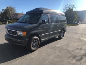 left front 2005 ford E 350 grey